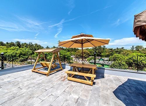 Dongbackdongsan Pension Jeju Bagian luar foto